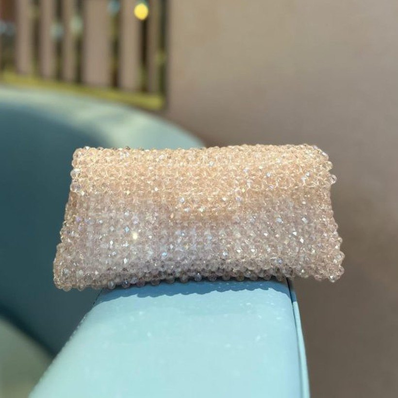 Aria, a pink crystal-beaded clutch