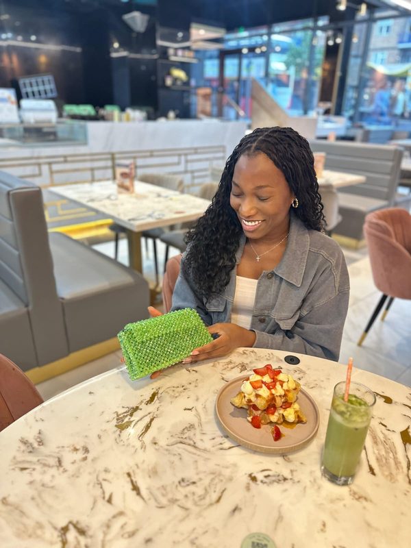 Customer photo with a pearl bag