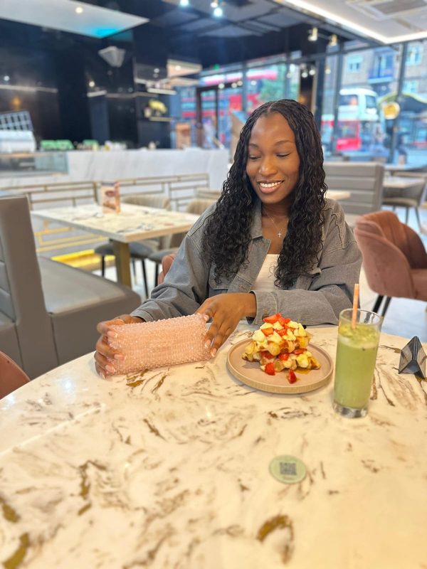 Customer photo with a champagne bag