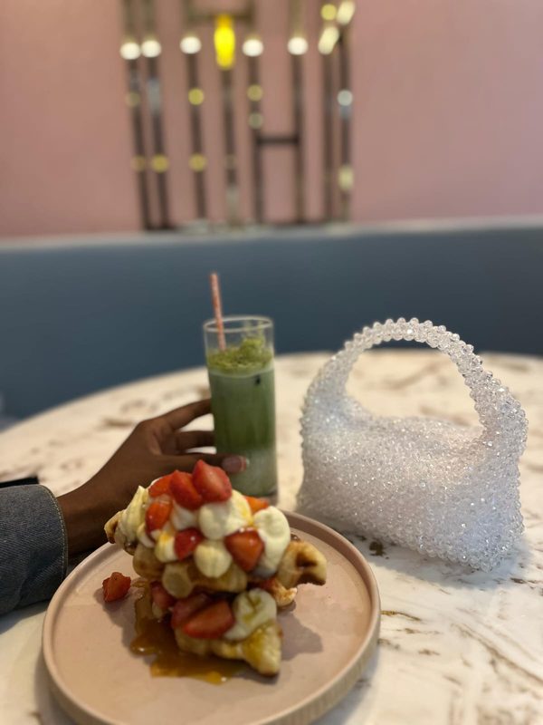 Customer photo with a Bag of Grace clutch